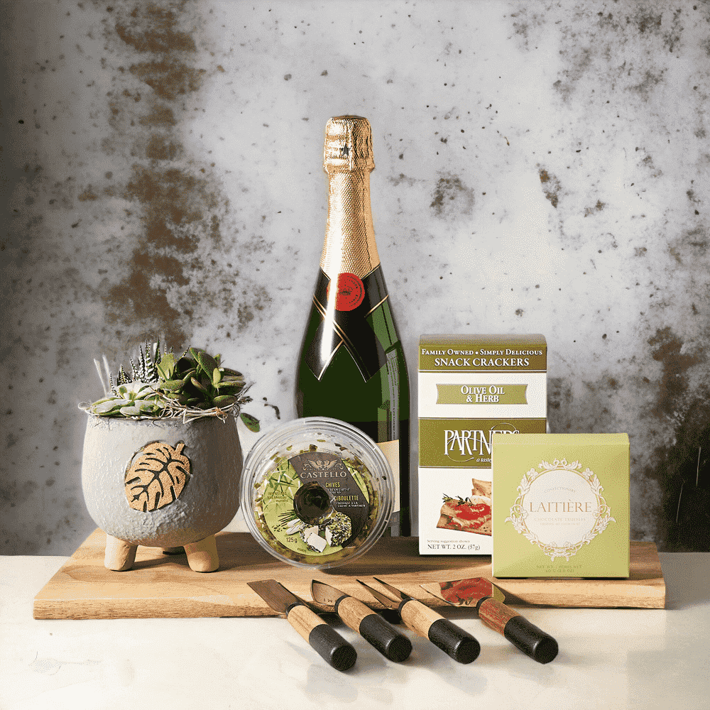 A Special Celebration Gift Basket Sparkling Wine, Brass Charcuterie Knife Set, Tripod Succulent Planter Arrangement, Cheese, Crackers, Chocolate Truffles and Board.