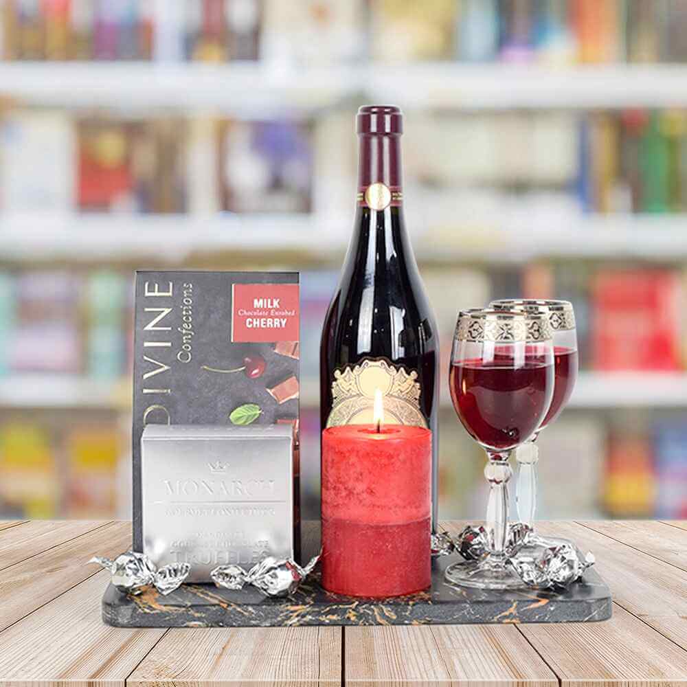 hocolate Cherries, Candle, & Wine Gift Set - Chocolate - Truffles - Monarch - Silver, Pomegranate scented candle - Short ; 2 Wine Glasses with Ornate Pattern Rim; Marble Serving Board; Devine Confections Milk Chocolate Cherries; Bottle of Wine.