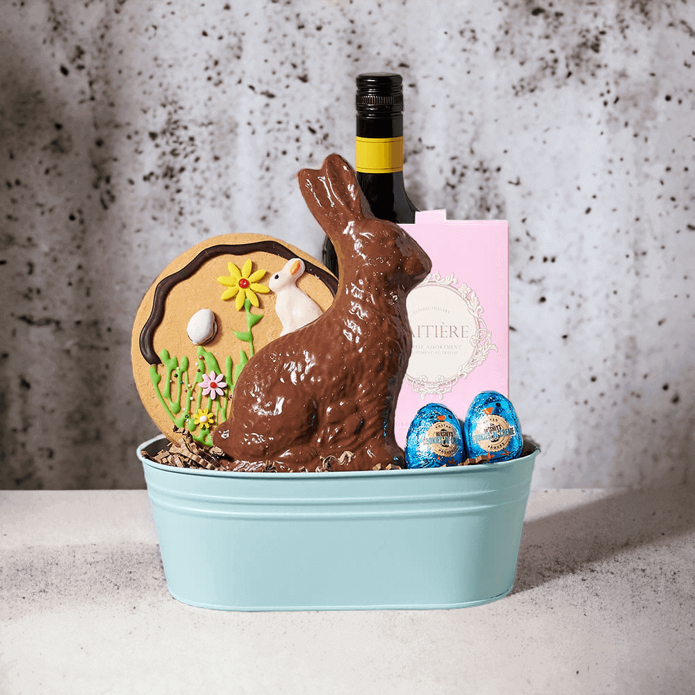 Easter Bunny & Wine Gift Basket features Wine, Cookie, Chocolate, & Teal Metal Bucket.
