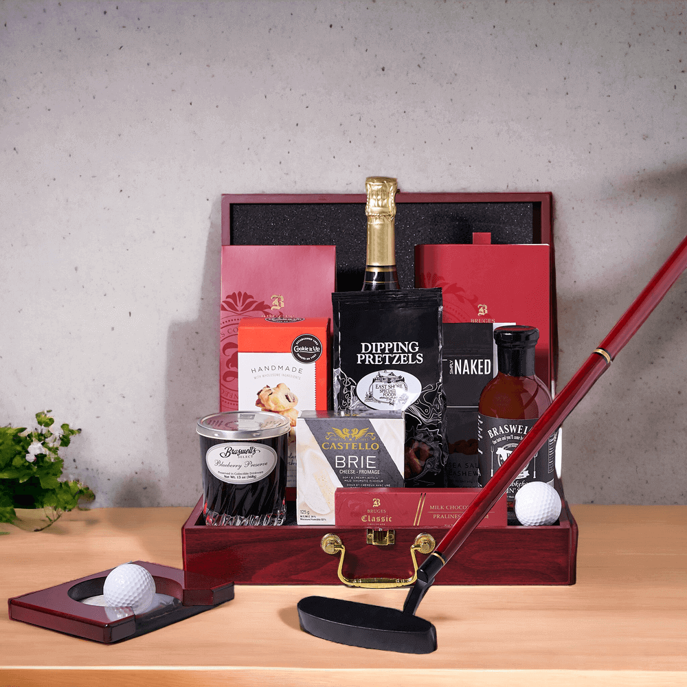 Gracious Golf Gift Basket features Sparkling Wine, Chocolate, Nuts, BBQ Sauce, Preserves, Cheese, Pretzels, Cookies, & an Oniva Ace Executive Putter Set.