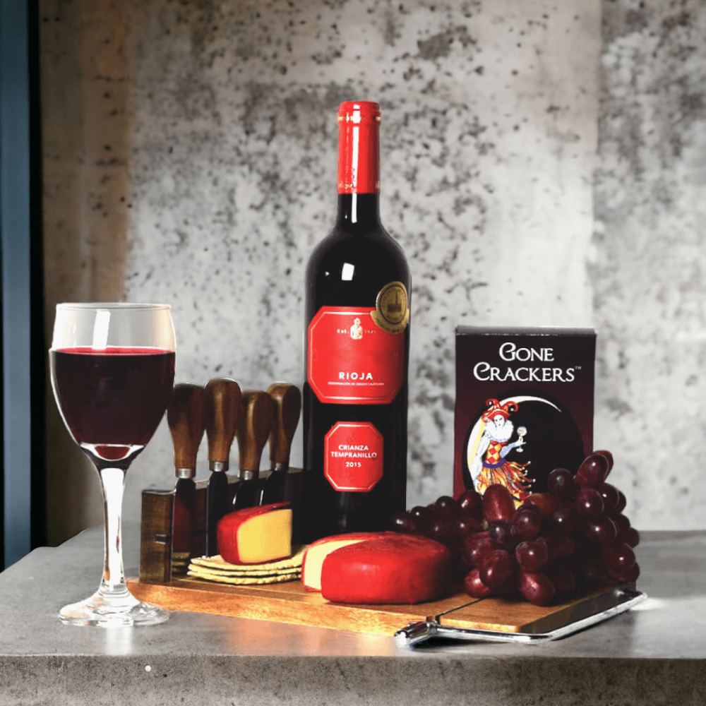 The Perfect Wine Gift Set also features a unique cutting board that is perfect for cutting cheese, as well as holding the cheese knives!