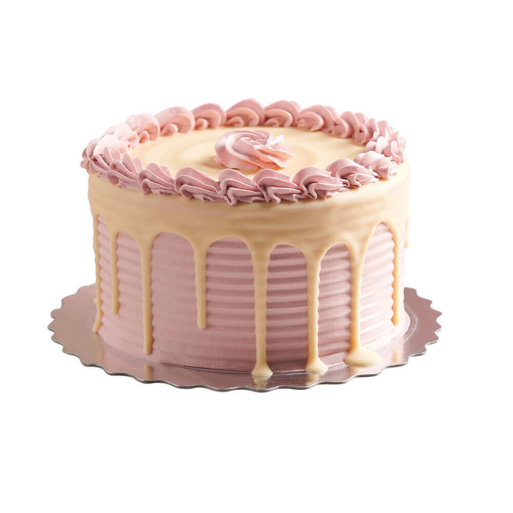 Vanilla Cake with Raspberry Buttercream measures 6 inches in diameter and features multiple layers of raspberry buttercream in between the layers of tender vanilla cake.