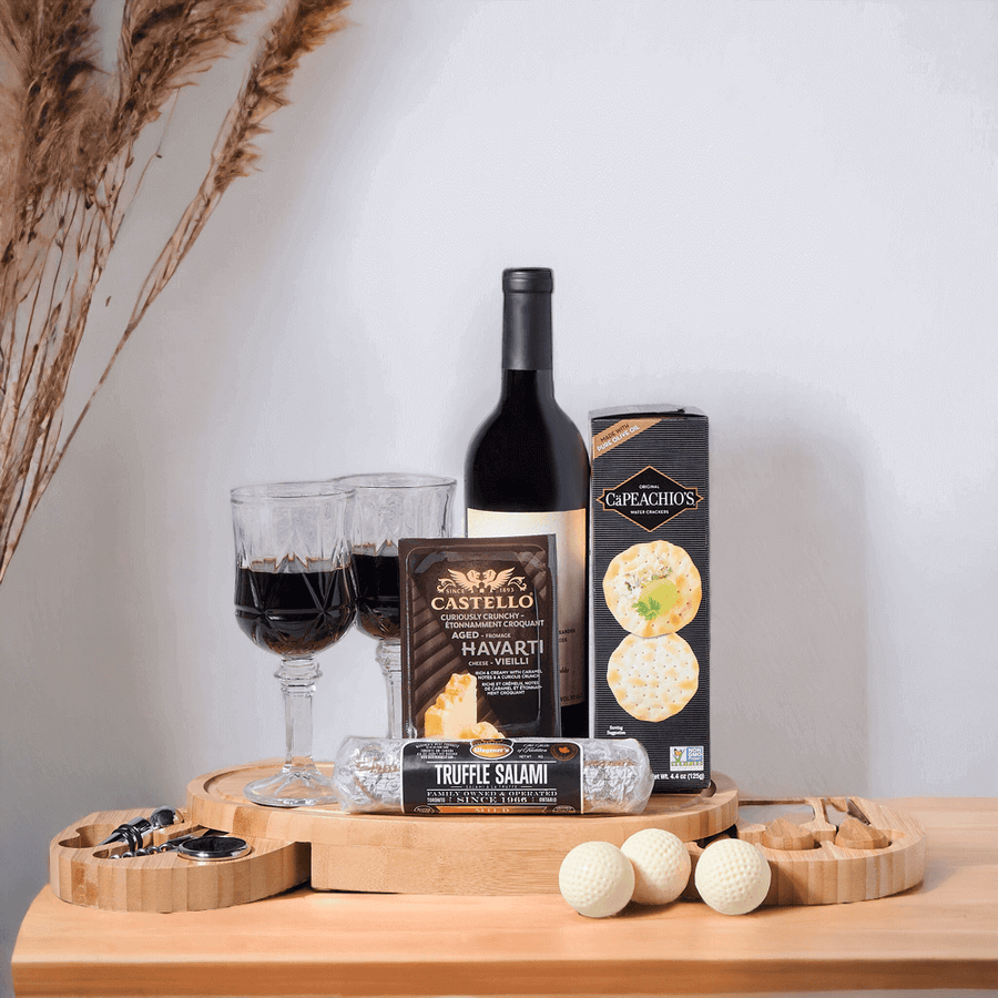The Wine & Chocolate Golf Balls Cutting Board includes a wonderful assortment of gourmet snacks that are bold, decadent and flavorful.